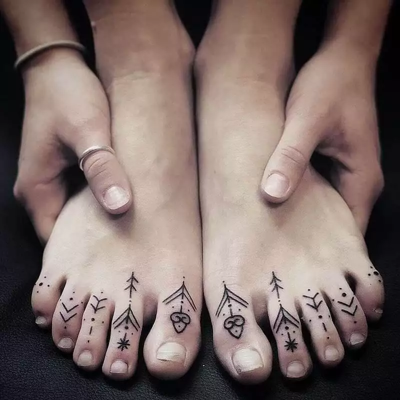 Tattoo dedos dos pés