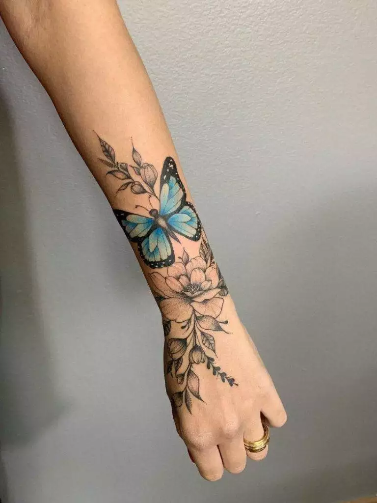 borboleta e floral braço